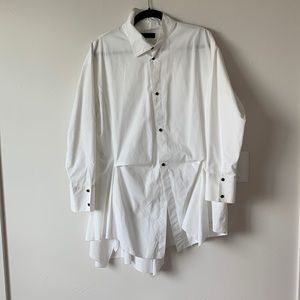 Moyuru asymmetrical white blouse with beautiful draped back and side panels.